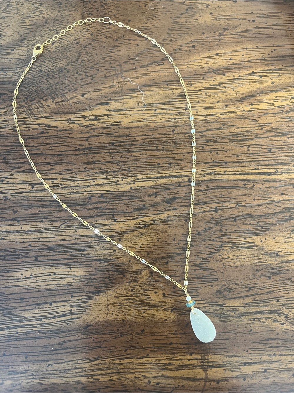 Crystal necklace with druzy pendant and pearl and aquamarine accents on chain